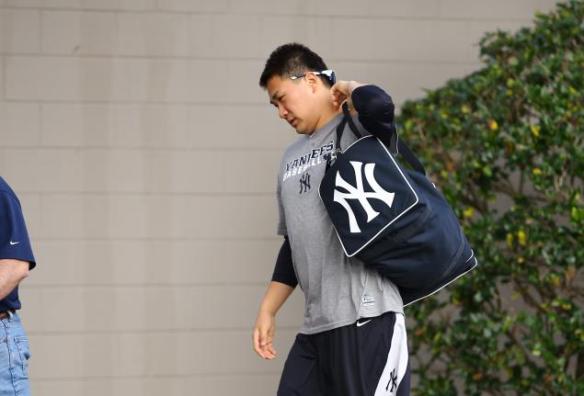Masahiro Tanaka arrives in New York