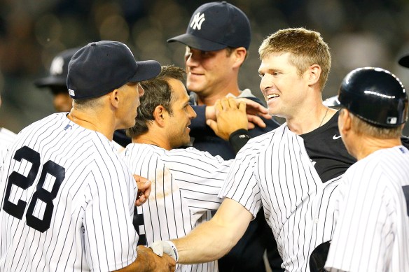 Chase Headley shakes hands with Joe Girardi