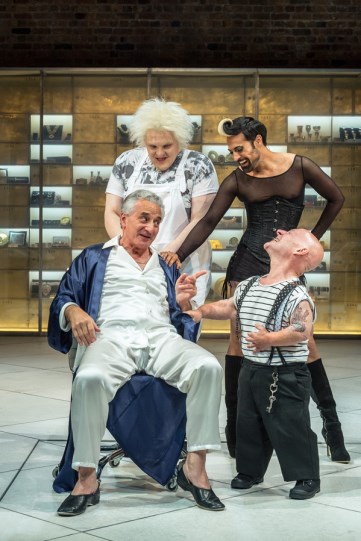 Henry Goodman (Volpone) with Jon Key as Nano, his dwarf supported by his entourage of Androgyno (Ankur Bahl) and Castrone (Julian Hoult)